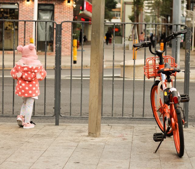 Child in busy city